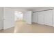 Spacious basement with plenty of closet space and light colored wood-look flooring at 5123 Richland Dr, Raleigh, NC 27612