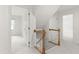 Hallway view of stairway and access to bedrooms at 5123 Richland Dr, Raleigh, NC 27612