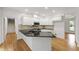 Well-equipped kitchen with granite countertops, stainless steel appliances, and ample cabinet space at 5123 Richland Dr, Raleigh, NC 27612
