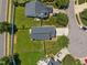 Aerial view of the home showing the roof, backyard and driveway at 5300 Roan Mountain Pl, Raleigh, NC 27613