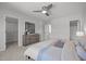 Comfortable bedroom features neutral carpet, closet, and ensuite bathroom at 5300 Roan Mountain Pl, Raleigh, NC 27613