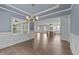 Open concept dining room looking into kitchen and living area at 543 Allessandra Dr, Clayton, NC 27527