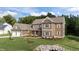 Lovely two-story home with professionally landscaped front yard, new sod and plantings at 543 Allessandra Dr, Clayton, NC 27527