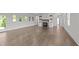 Bright and airy living room with large windows and a modern fireplace at 543 Allessandra Dr, Clayton, NC 27527