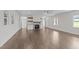 Spacious living room with ample light from the many windows and a beautifully tiled fireplace at 543 Allessandra Dr, Clayton, NC 27527