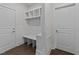 Well-organized mudroom with coat hooks, bench seating, and practical storage solutions at 543 Allessandra Dr, Clayton, NC 27527