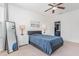 Bedroom boasts natural light, neutral carpeting, ceiling fan, and walk-in closet at 543 Callandale Ln, Durham, NC 27703