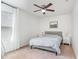 Bedroom boasts natural light, neutral carpeting, ceiling fan, and bedside tables at 543 Callandale Ln, Durham, NC 27703