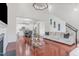 Spacious living area with hardwood floors, view to the kitchen, and modern decor at 543 Callandale Ln, Durham, NC 27703