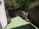 Fenced backyard with a storage area that is perfect for enjoying outdoor living at 5893 Shady Grove Cir, Raleigh, NC 27609