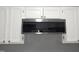 Frigidaire stainless steel microwave with white cabinets at 5893 Shady Grove Cir, Raleigh, NC 27609