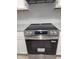 Sleek stainless steel Frigidaire stove and oven with modern controls at 5893 Shady Grove Cir, Raleigh, NC 27609