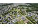 A beautiful aerial view of the neighborhood showcasing lush greenery and well-maintained homes at 690 Great Ridge Pkwy, Chapel Hill, NC 27516