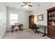 Bedroom with desk, bookshelf, and ceiling fan for a comfortable home office setting at 690 Great Ridge Pkwy, Chapel Hill, NC 27516