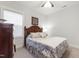 Bedroom with a plush bed, soft carpet, and natural light from the window at 690 Great Ridge Pkwy, Chapel Hill, NC 27516