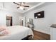 Bright bedroom features wood floors, ceiling fan, tray ceilings and access to a walk in closet at 690 Great Ridge Pkwy, Chapel Hill, NC 27516