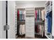 Walk-in closet with custom shelving and plenty of space for storage and organization at 690 Great Ridge Pkwy, Chapel Hill, NC 27516