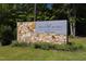 Briar Chapel by Newland community sign featuring stone base, landscaping, and forest background at 690 Great Ridge Pkwy, Chapel Hill, NC 27516