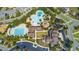 A stunning aerial view of the community pool with a slide, umbrellas, and ample parking at 690 Great Ridge Pkwy, Chapel Hill, NC 27516