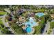 An aerial view of the pool area, featuring a water slide and lounge chairs at 690 Great Ridge Pkwy, Chapel Hill, NC 27516