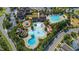 An aerial view of the pool area, featuring a water slide and lounge chairs at 690 Great Ridge Pkwy, Chapel Hill, NC 27516