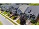 Street view of well-maintained front yards and exteriors of modern homes in a suburban neighborhood at 690 Great Ridge Pkwy, Chapel Hill, NC 27516