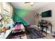 Bright room with a fun geometric accent wall and comfortable furniture at 767 Omaha Dr, Broadway, NC 27505