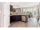 Kitchen featuring wood-look floors, stainless appliances, and granite countertops at 767 Omaha Dr, Broadway, NC 27505