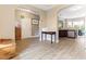 View of the open floor plan into the kitchen with stainless appliances and granite countertops at 767 Omaha Dr, Broadway, NC 27505