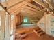 Framed attic space with dormer windows offering potential for expansion or storage at 8 Pin Tail Ct, Pittsboro, NC 27312