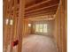 A framed bedroom with multiple windows providing plenty of natural light at 8 Pin Tail Ct, Pittsboro, NC 27312