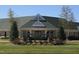 Chapel Ridge Property Owners Club sign, lush landscaping, and a welcoming entrance at 8 Pin Tail Ct, Pittsboro, NC 27312