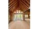 Interior framing of a home with a large opening with sliding doors to the outdoor area at 8 Pin Tail Ct, Pittsboro, NC 27312