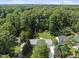 Lush, green trees surround this lovely home, creating a private and peaceful atmosphere at 821 Van Thomas Dr, Raleigh, NC 27615