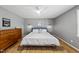 Comfortable bedroom with a cozy bed, natural light, and contemporary decor at 821 Van Thomas Dr, Raleigh, NC 27615