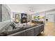 Comfortable living room features hardwood floors, ceiling fan, fireplace, and stylish decor at 821 Van Thomas Dr, Raleigh, NC 27615