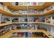 Walk-in pantry features custom shelving and a variety of food storage containers at 821 Van Thomas Dr, Raleigh, NC 27615