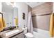 Charming bathroom featuring neutral colors, and bathtub with shower at 8341 Running Fern Way, Willow Springs, NC 27592