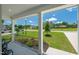 Covered front porch with a view of the landscaped front yard and neighborhood at 8341 Running Fern Way, Willow Springs, NC 27592