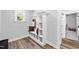 Mudroom featuring a built-in bench with storage cubbies, perfect for organization at 8341 Running Fern Way, Willow Springs, NC 27592