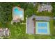 Aerial shot showcasing community pool, tennis courts, clubhouse, parking and lush landscaping for an active lifestyle at 8412 Old Deer Trl, Raleigh, NC 27615