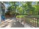 Back deck overlooking the treed backyard at 8412 Old Deer Trl, Raleigh, NC 27615