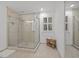 Bathroom with a glass enclosed shower and tile surround at 8412 Old Deer Trl, Raleigh, NC 27615