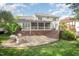 Expansive backyard featuring a multi-level deck, patio, and pergola, ideal for outdoor living and entertaining at 9021 Winged Thistle Ct, Raleigh, NC 27617