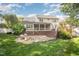 Beautiful backyard features a deck, patio, and lush landscaping, creating a serene outdoor living space at 9021 Winged Thistle Ct, Raleigh, NC 27617