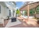 Backyard deck featuring hot tub, fire pit, and grilling area at 9021 Winged Thistle Ct, Raleigh, NC 27617