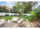 Relaxing backyard with a paved patio and comfortable outdoor seating, creating an ideal space for gatherings at 9021 Winged Thistle Ct, Raleigh, NC 27617