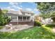 Spacious backyard featuring a patio, deck, and pergola, offering multiple areas for outdoor activities and relaxation at 9021 Winged Thistle Ct, Raleigh, NC 27617