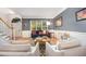 Inviting living room features hardwood floors, ample natural light, and stylish decor at 9021 Winged Thistle Ct, Raleigh, NC 27617