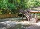 Multi-level wooden deck and stairs in the backyard, providing access to outdoor living spaces at 907 W Johnson St, Raleigh, NC 27605
